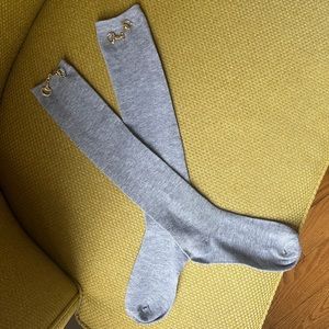 Grey knee socks with horse-bit detail